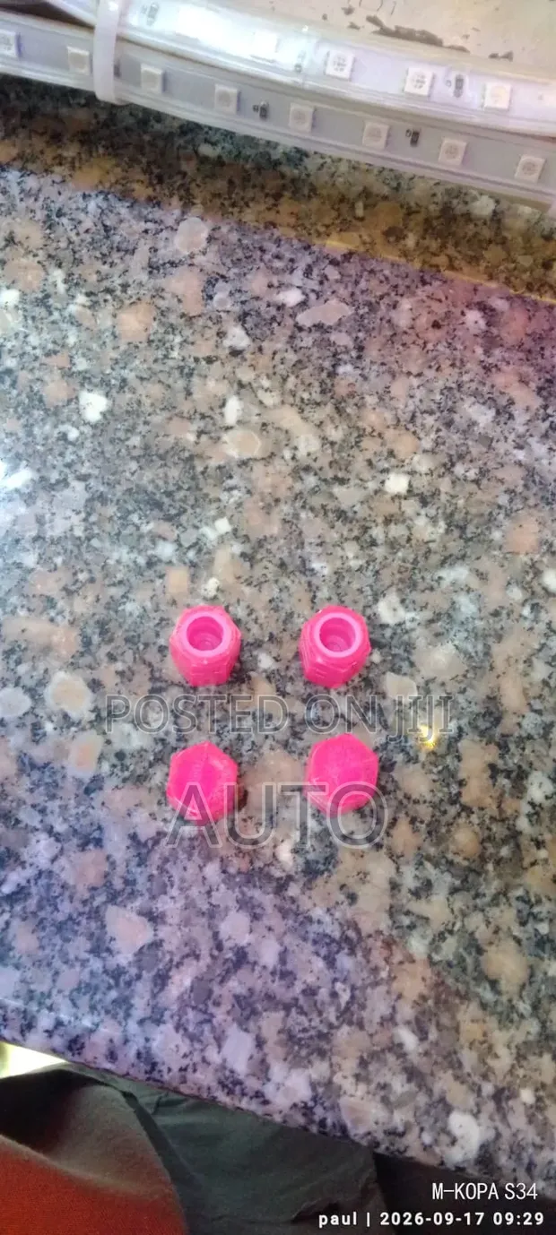 Pink Glow Car Wheel Nozzle Caps - 1