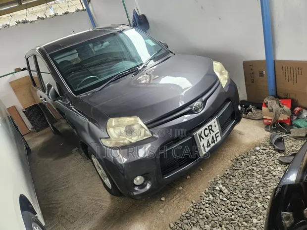 Toyota Sienta 2011 Gray - 1