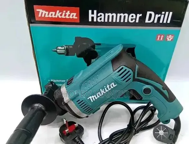 Makita Corded Hammer Drill - Brand New - 1