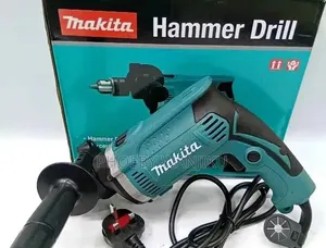 Makita Corded Hammer Drill - Brand New