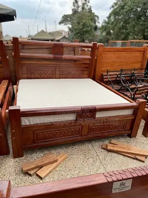 Palatial Mahogany King Size Bed with Handcarved Geometric Panels