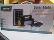 Dat Solar Rechargeable System with 4 Bulbs & FM Radio - 1
