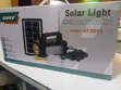 Dat Solar Rechargeable System with 4 Bulbs & FM Radio - 2