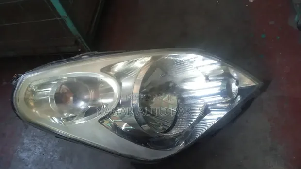 Suzuki Splash 2012 Headlight (Used) - 1