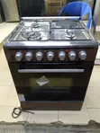 Haier 60x60 Gas Cooker with Electric Oven & Wok Burner - 1