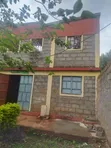 Prime Commercial 1/4 Acre Plot with Hostels for Sale at Kutus - 1