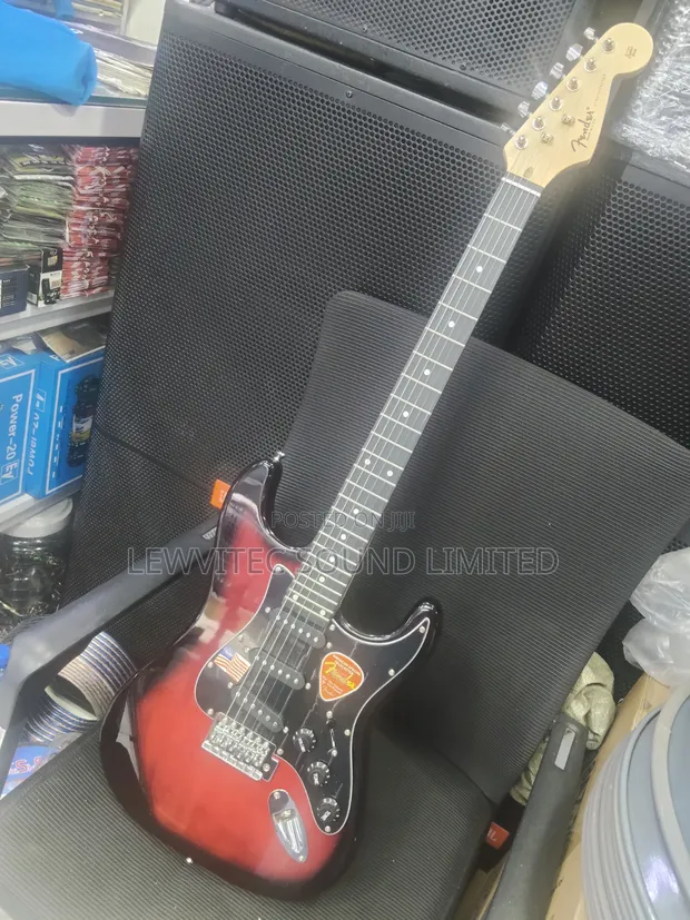 Red Fender Solo Electric Guitar - 1