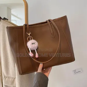 Women's Leather Shoulder Tote Bag with Fur Charm