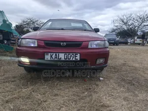 Mazda Etude 1997 Rangi ya Maroon