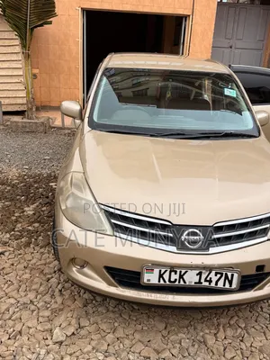 Nissan Tiida 2009 Dhahabu