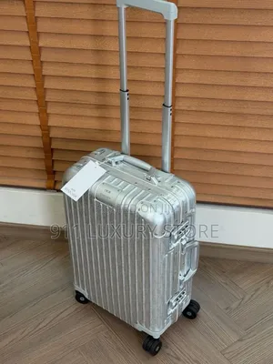 Dior x Rimowa Aluminium Suitcase
