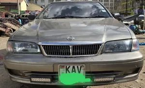 Nissan FB14 1999 Dhahabu