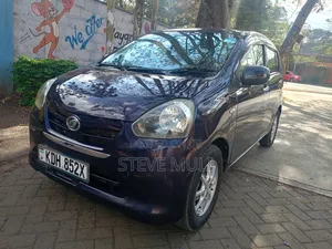 Daihatsu Mira 2015 Zambarau