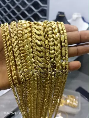 24 Karat Gold Chain and Pendant