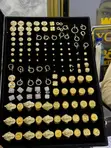 Gold Earrings and Rings - 1