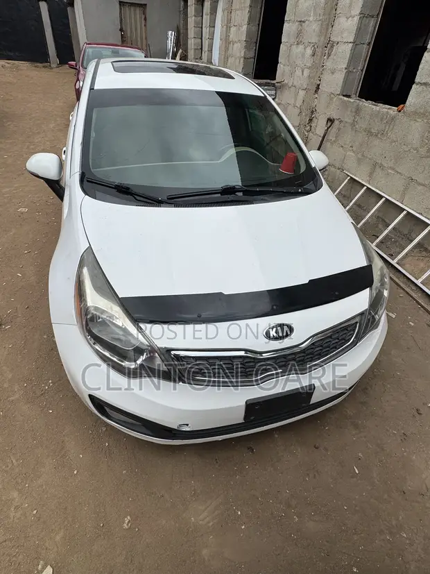 Kia Rio SX 4dr Sedan (1.6L) 2014 Fari - 1