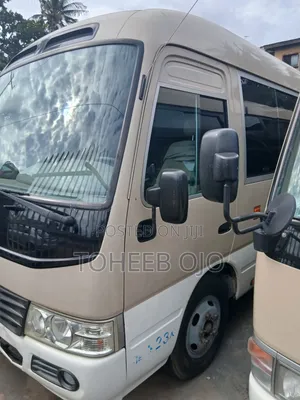 Toyota Coaster 2017 - Brown