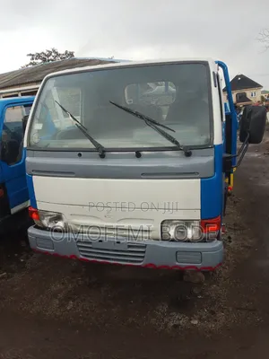 Nissan Cabstar Na Tayar Guda Shida Da Babban Bucket Na Diesel