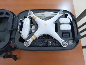 DJI Phantom 3 SE Drone with 2 Batteries, Extra Wings, and Bag