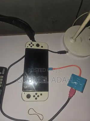 Nintendo Switch OLED Mai layi A Fuska