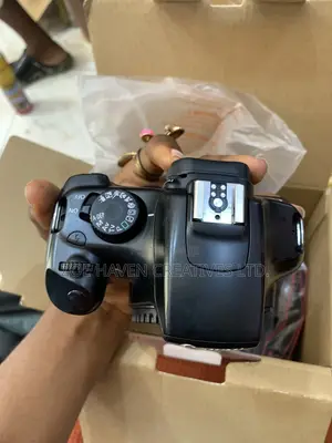 Canon EOS 1100D DSLR Camera with 18-55mm Lens