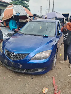 Mazda 3 2004 Mai Amfani a Ƙasashen Waje, Shuɗi