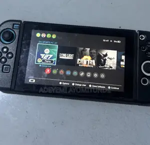 Nintendo Switch with Games, 2 Controllers, and Pouch