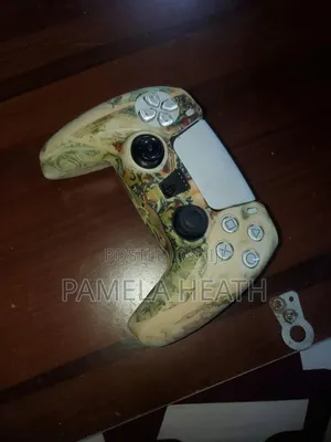 PS5 DualSense Controller - An Kuma Amfani