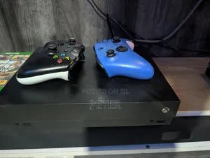 Xbox One X tare da Kwamfuta 2 da Wasanni 7