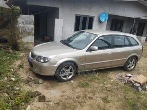 Mazda 323 2006 Zinari