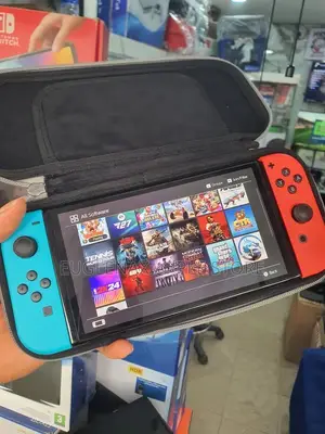 Nintendo Switch OLED with 18 Latest Games + FC 27