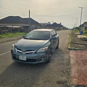 2010 Toyota Corolla LE Sedan - Babu Hatsari