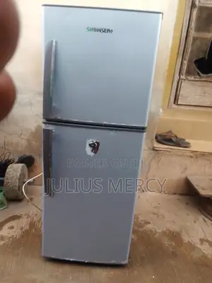 Neatly Used Snowsea Top Freezer Refrigerator