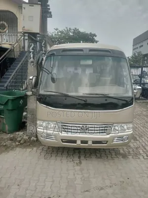 Toyota Coaster 2009 Bus - Gold