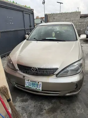 2004 Toyota Camry LE V6 Sedan - Gold