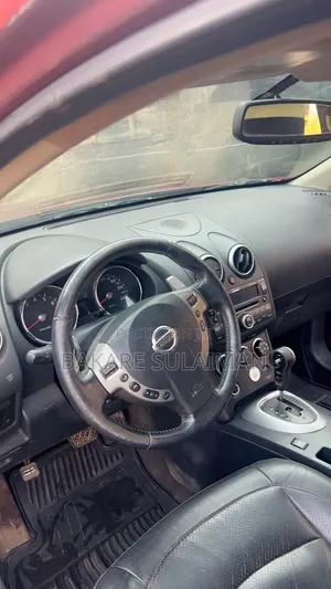 2009 Nissan Rogue S AWD Red