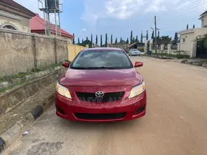 2010 Toyota Corolla LE Sedan - Wata Kasar Amfani